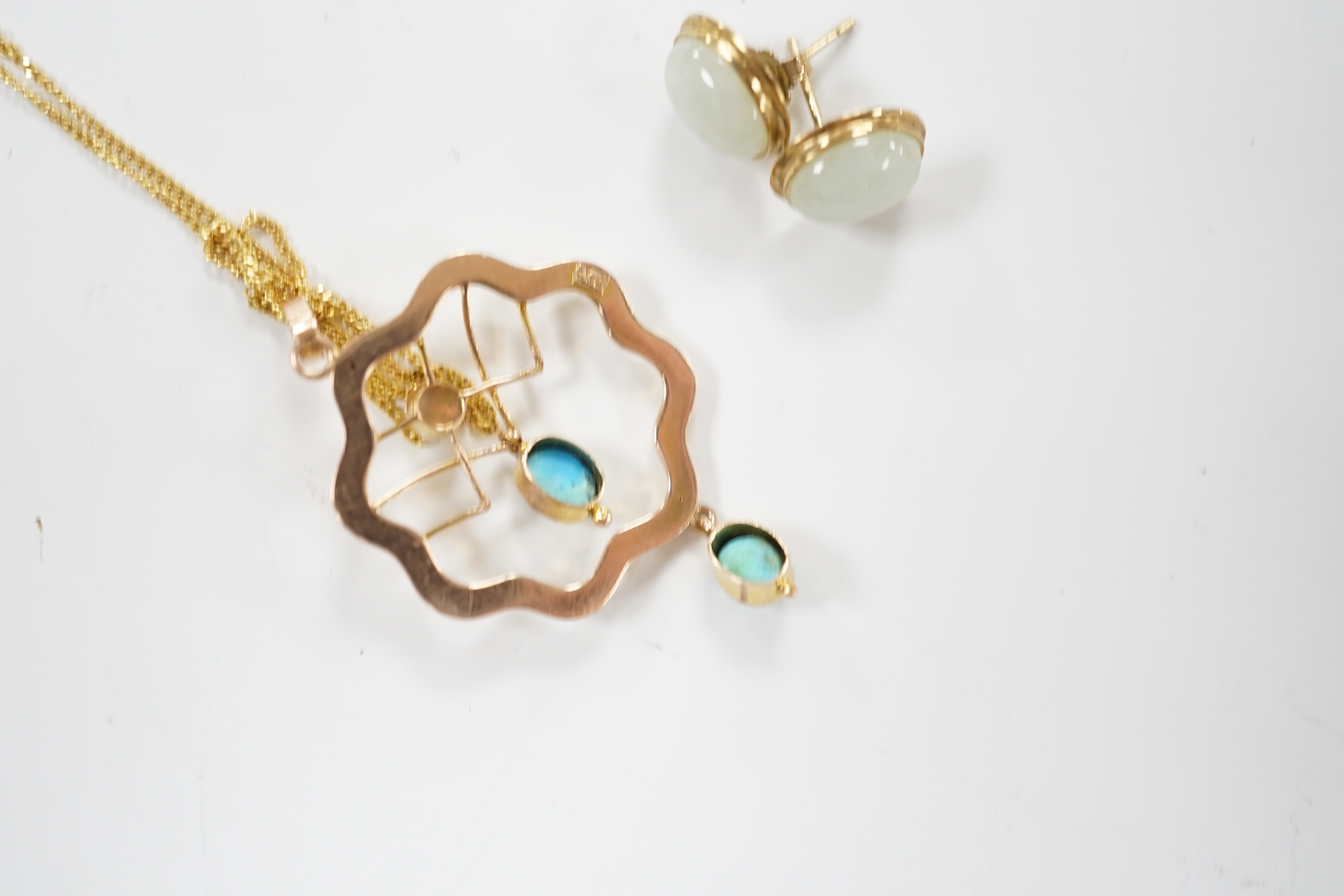 An Edwardian yellow metal, turquoise and white opal set drop pendant, 40mm, on a later 9ct gold fine link chain, 46cm and a pair of 9k and cabochon jade set ear studs, one butterfly missing.
